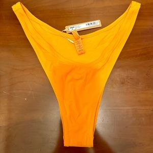 BRAND NEW SKIMS CHEEKY TANGA SWIM BOTTOMS SIZE L